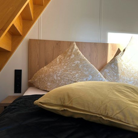 Glockenalm Tiny Chalet Schlafzimmer, &copy; NATURAMA Glockenalm